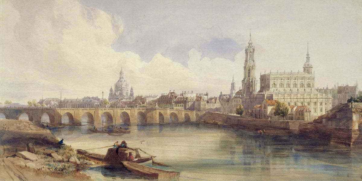 A 19th-century Romantic watercolor panorama by Thomas Shotter Boys showing the Dresden skyline from the south bank of the River Elbe, with moored flat-bottomed boats and figures in the foreground, a multi-arched stone bridge in the middle ground, and the Frauenkirche dome, Hofkirche tower, and Royal Palace visible beneath dramatic cumulus clouds in warm ochre and cream tones.