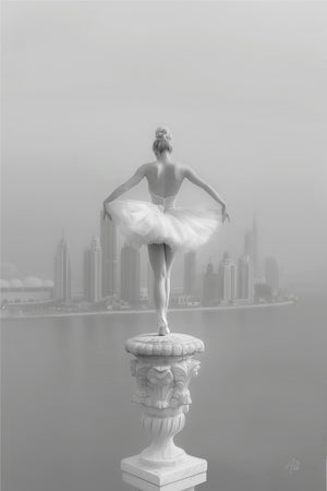 Black and white fine art photograph of a glowing ballerina in an hourglass pose, balanced atop a Dubai spire with the Dubai Water Canal and the city's futuristic skyline visible in the background, captured with high contrast and ethereal lighting.