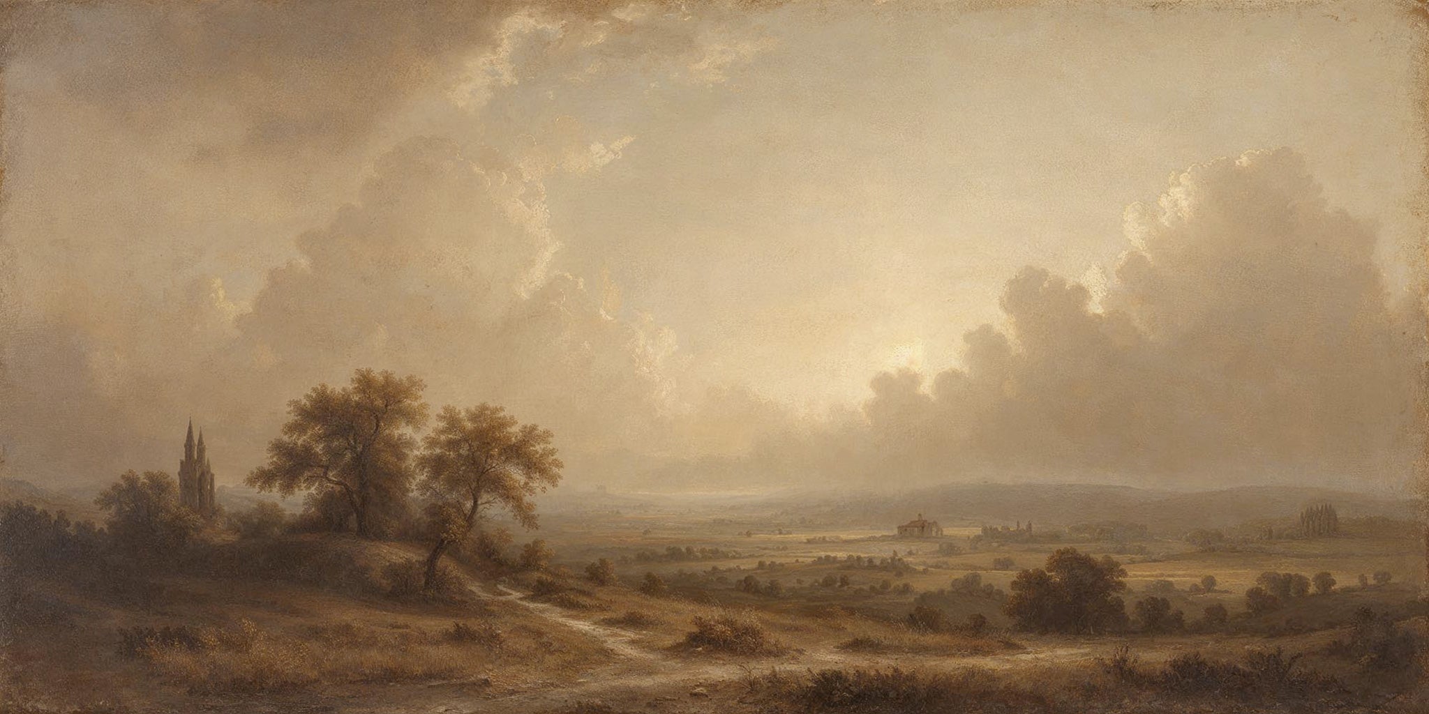 A wide-format 19th-century European landscape painting in warm golden and sepia tones, depicting a vast open valley viewed from an elevated foreground. A winding dirt path leads through dry grassy terrain toward a cluster of mature deciduous trees. A Gothic spire rises in the distance beside a faint villa structure. Soft luminous clouds fill a hazy sky with diffused light breaking through at center.