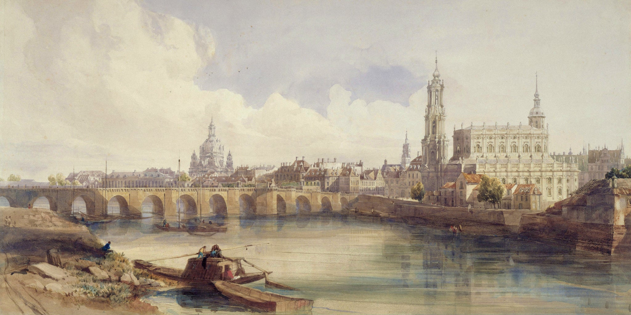 A 19th-century Romantic watercolor panorama by Thomas Shotter Boys showing the Dresden skyline from the south bank of the River Elbe, with moored flat-bottomed boats and figures in the foreground, a multi-arched stone bridge in the middle ground, and the Frauenkirche dome, Hofkirche tower, and Royal Palace visible beneath dramatic cumulus clouds in warm ochre and cream tones.