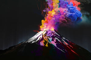 A vibrant photograph of a volcanic eruption with glowing plumes in shades of pink, purple, and yellow against a dark sky.