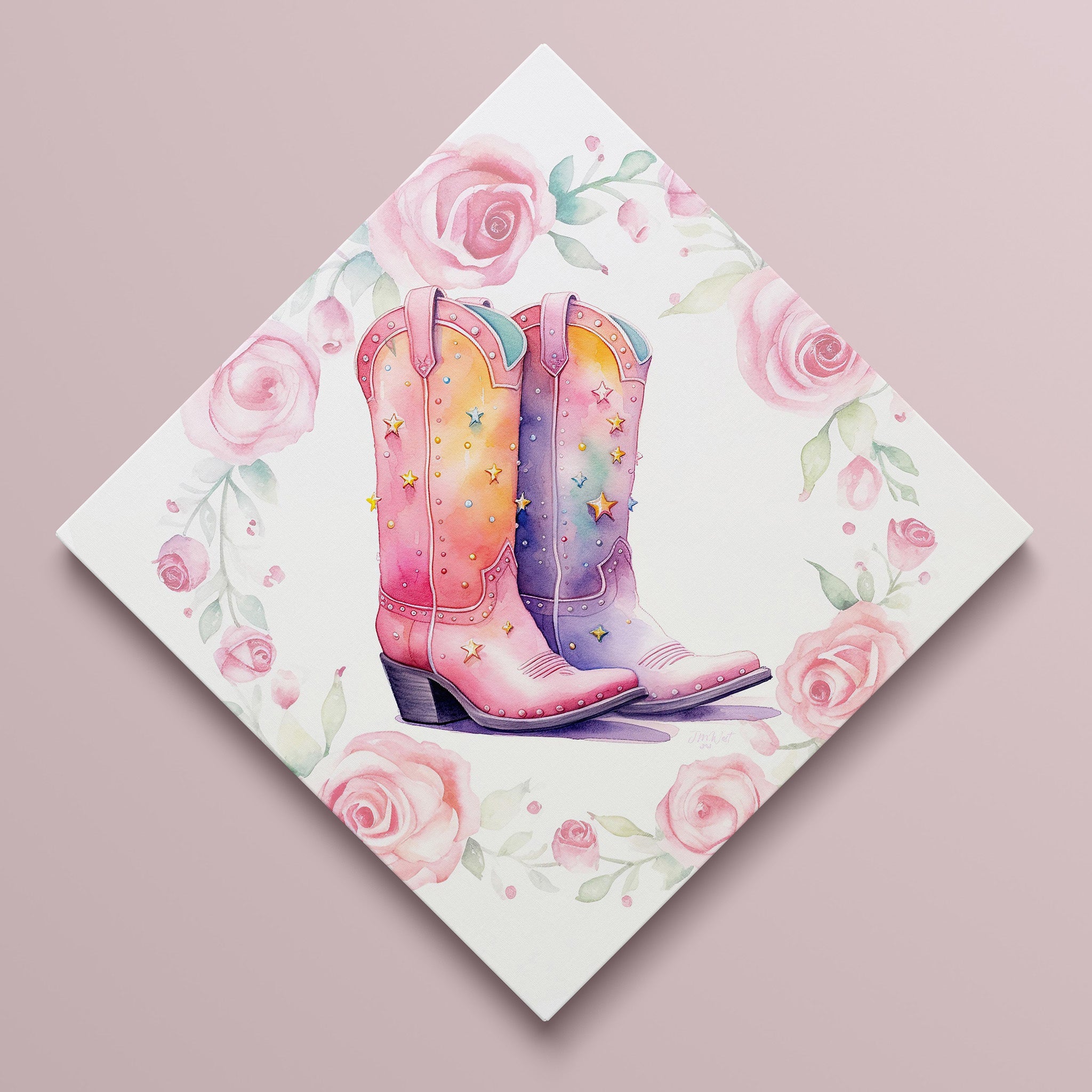 Watercolor illustration of pink cowgirl boots surrounded by a pastel floral wreath, combining western style with soft botanical elements.